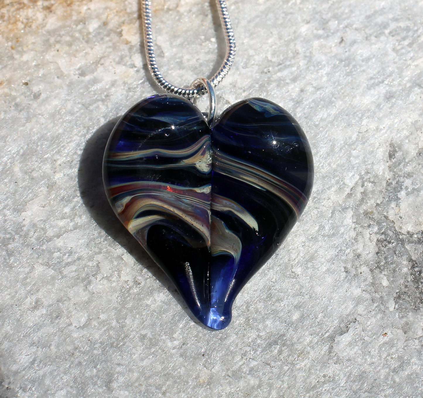 Ribbons of purple on a Blue Heart