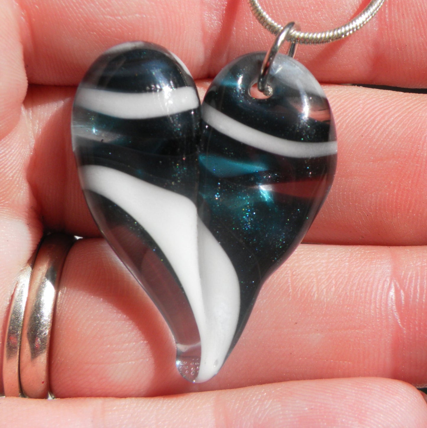 Sparkling Blue Twisted White Heart Pendant